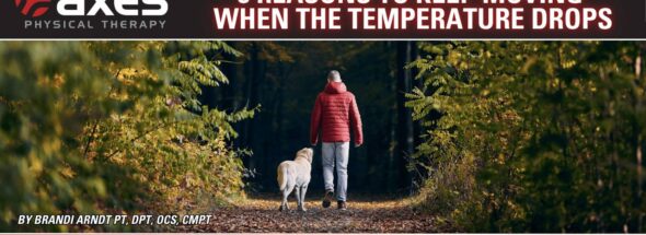 Active man walking a yellow lab outdoors on a crisp fall day representing cold weather workout injury prevention and physical therapy for winter joint pain in St Louis